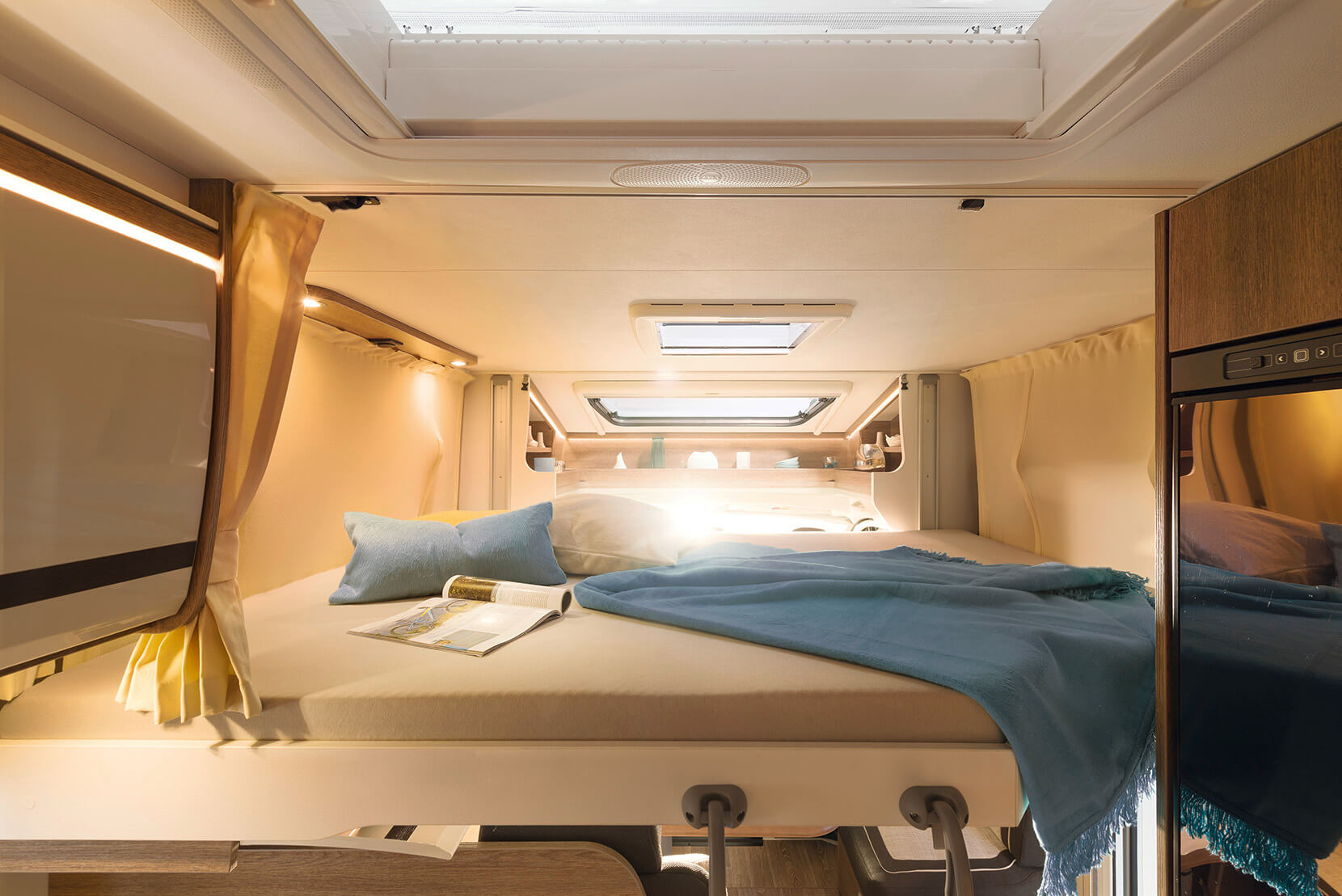 Low Profile: if desired, with electric pull-down bed. Depending on the model, this makes one or two additional berths available at the press of a button (pull-down beds are fitted as standard in A Class models)